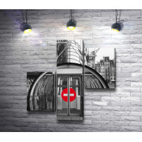 Вход в метро в черно-белой гамме с красным знаком "Стоп"