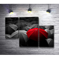 Красный зонт среди черно-белых 
