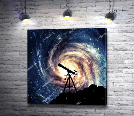 Телескоп на фоне галактики 